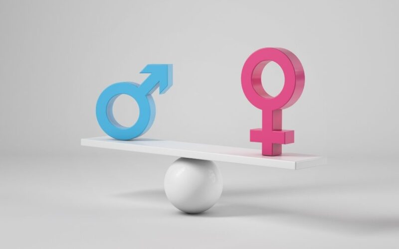 Esonero parità di genere 2026 rappresentato con simboli uomo e donna in equilibrio su una bilancia